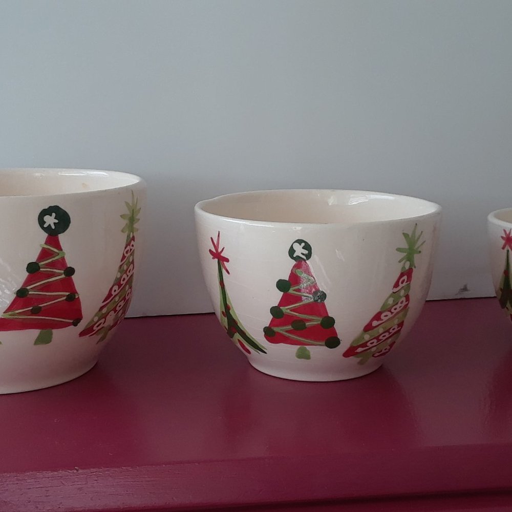 three matching Christmas bowls